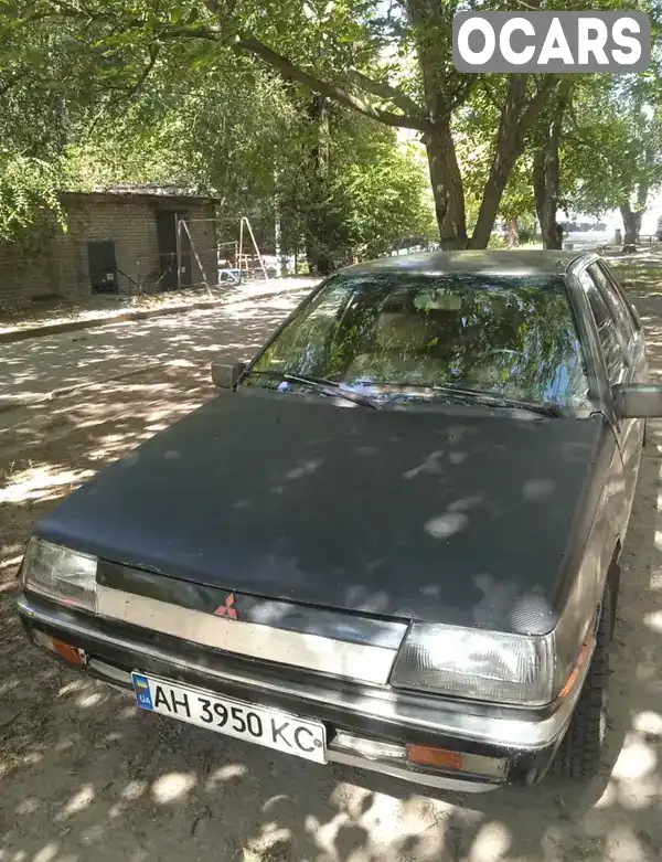 Седан Mitsubishi Lancer 1986 1.47 л. Ручна / Механіка обл. Дніпропетровська, Кам'янське (Дніпродзержинськ) - Фото 1/4