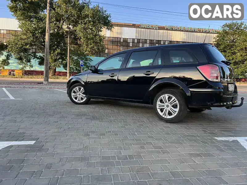 W0L0AHL35A5032936 Opel Astra 2010 Універсал 1.91 л. Фото 4