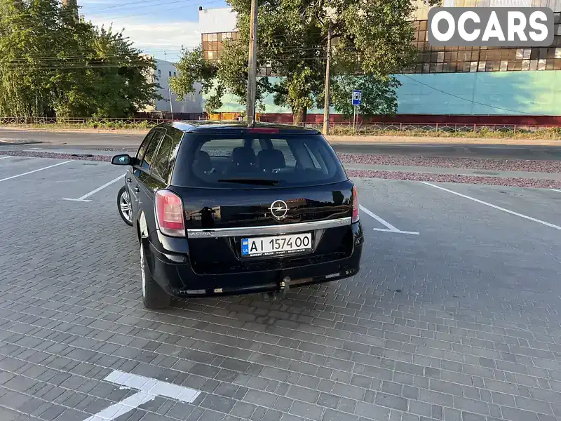 W0L0AHL35A5032936 Opel Astra 2010 Універсал 1.91 л. Фото 7