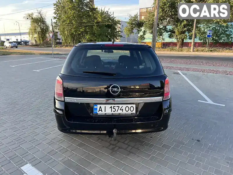 W0L0AHL35A5032936 Opel Astra 2010 Універсал 1.91 л. Фото 8