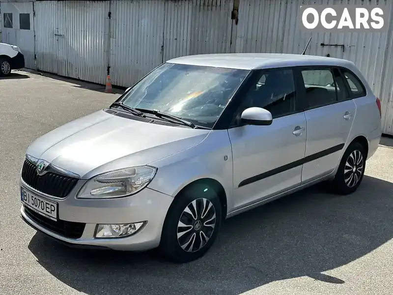 TMBJS25J7C3032023 Skoda Fabia 2011 Универсал 1.6 л. Фото 1