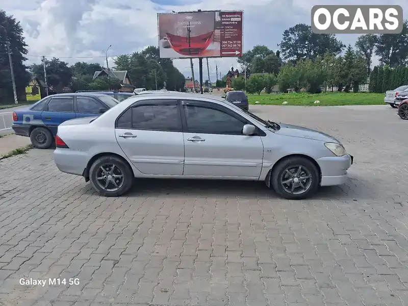 Седан Mitsubishi Lancer 2009 1.58 л. Ручная / Механика обл. Черновицкая, Черновцы - Фото 1/21