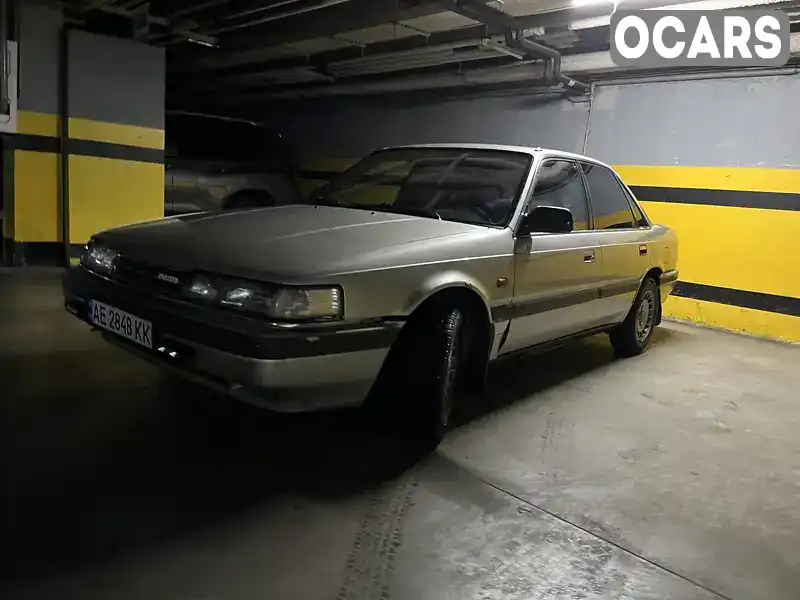 Хетчбек Mazda 626 1988 1.8 л. Ручна / Механіка обл. Дніпропетровська, Дніпро (Дніпропетровськ) - Фото 1/7