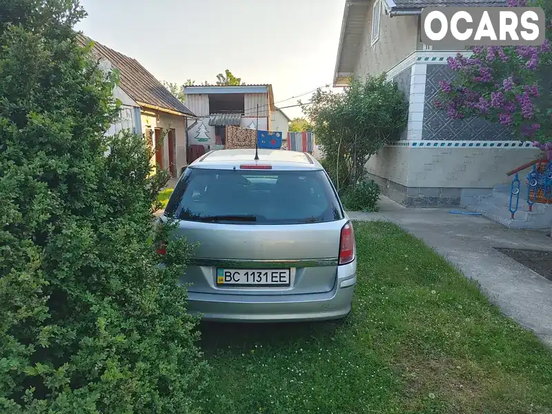 W0L0AHL35A2051749 Opel Astra 2010 Універсал  Фото 2