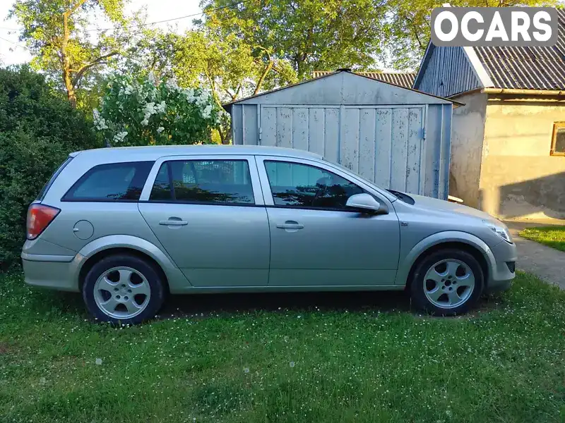 W0L0AHL35A2051749 Opel Astra 2010 Універсал  Фото 4