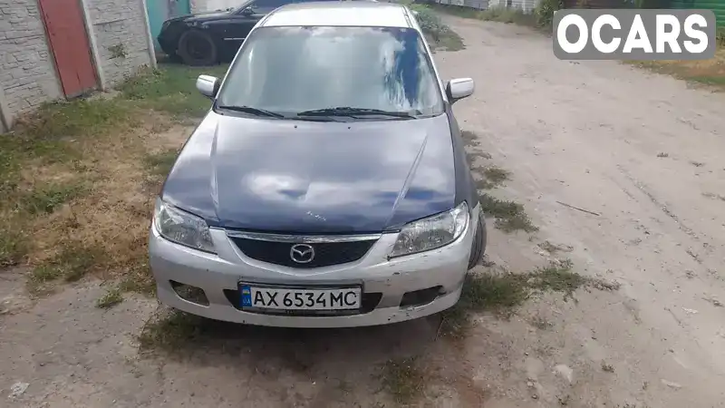 Хетчбек Mazda 323 2002 1.6 л. Ручна / Механіка обл. Харківська, Харків - Фото 1/7