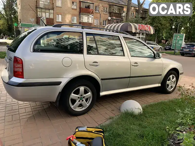 Універсал Skoda Octavia 2004 1.6 л. Ручна / Механіка обл. Київська, Вишневе - Фото 1/21