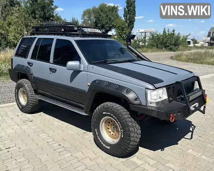 Внедорожник / Кроссовер Jeep Grand Cherokee 1993 5.21 л. Автомат обл. Черновицкая, Черновцы - Фото 1/13