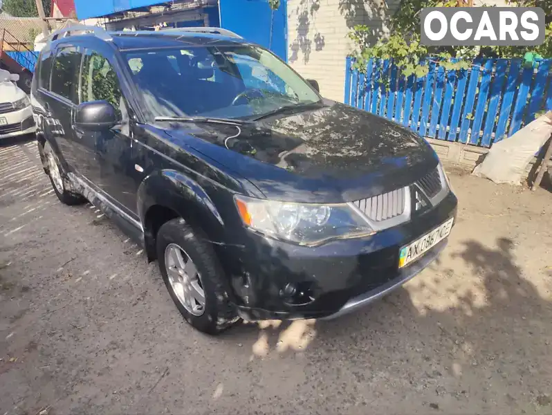 Позашляховик / Кросовер Mitsubishi Outlander 2009 2.36 л. Ручна / Механіка обл. Київська, Рокитне - Фото 1/9