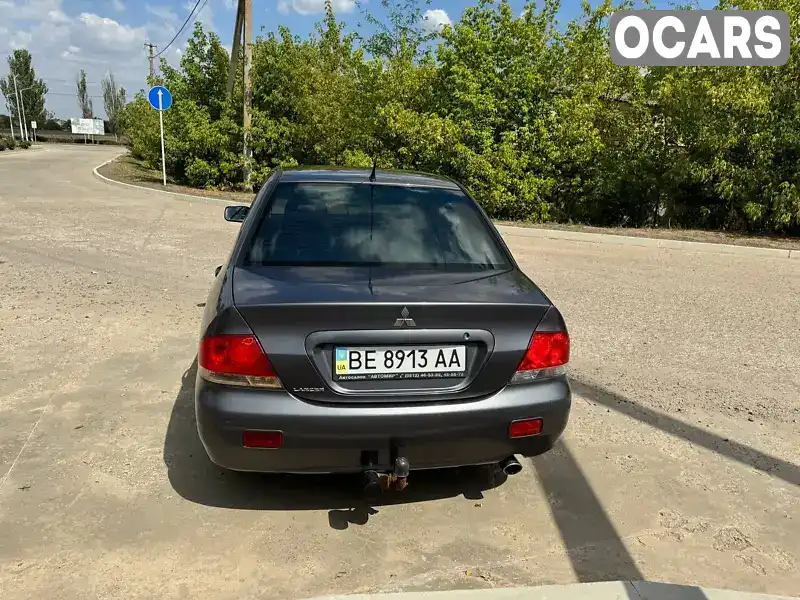 Седан Mitsubishi Lancer 2004 1.58 л. Ручна / Механіка обл. Миколаївська, Снігурівка - Фото 1/13