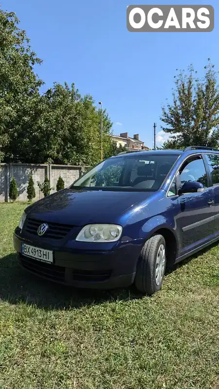 Мінівен Volkswagen Touran 2003 1.9 л. Ручна / Механіка обл. Хмельницька, Кам'янець-Подільський - Фото 1/21