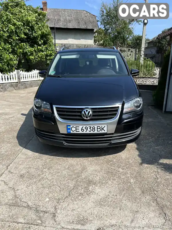 Мінівен Volkswagen Touran 2010 1.97 л. Ручна / Механіка обл. Чернівецька, Заставна - Фото 1/13