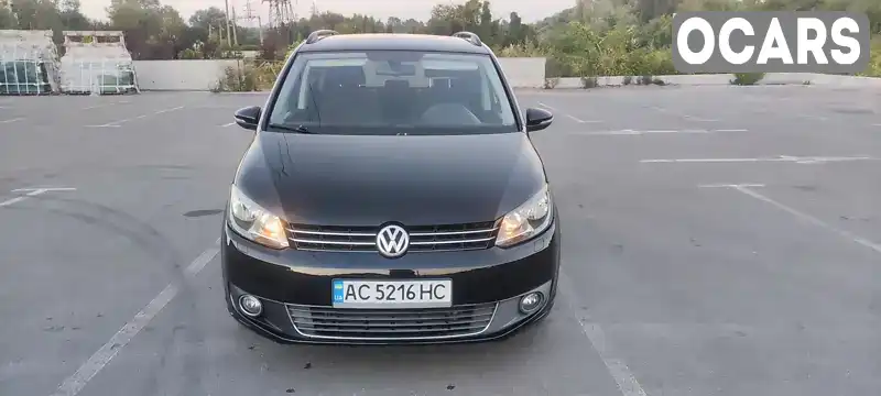 Мінівен Volkswagen Touran 2010 1.39 л. Автомат обл. Київська, Ірпінь - Фото 1/21