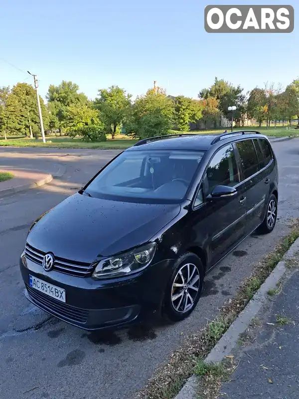 Мінівен Volkswagen Touran 2013 1.6 л. Ручна / Механіка обл. Волинська, Луцьк - Фото 1/8