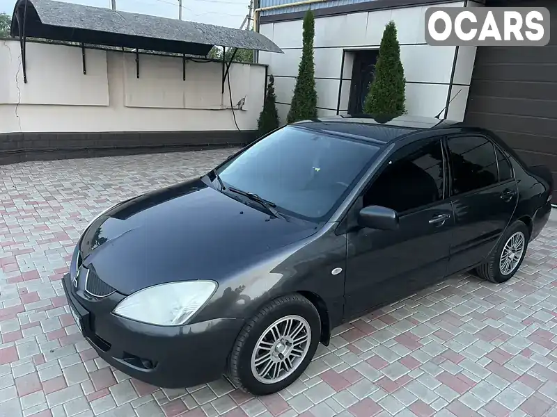 Седан Mitsubishi Lancer 2004 1.6 л. Ручна / Механіка обл. Харківська, Лозова - Фото 1/11