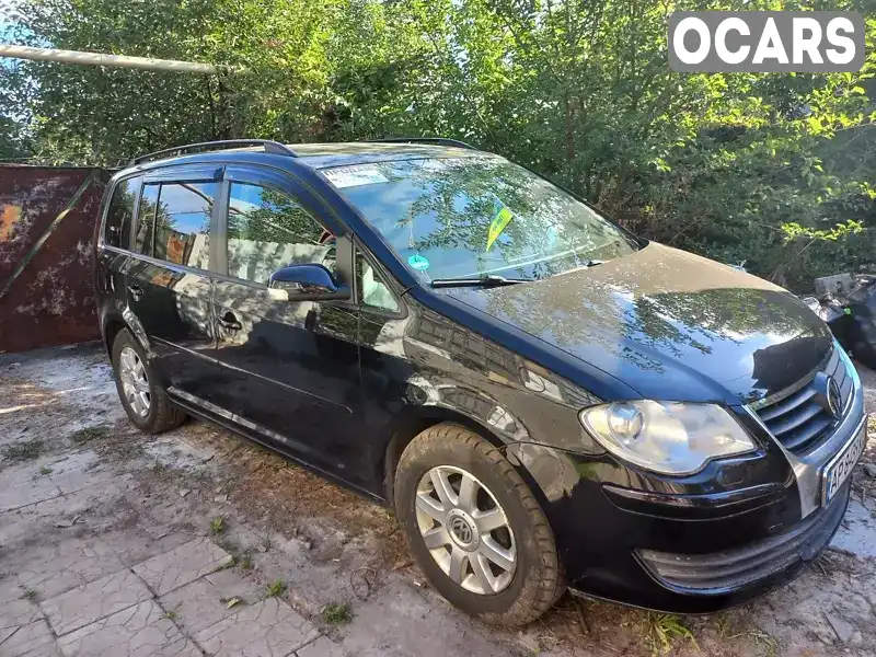 Мінівен Volkswagen Touran 2009 1.4 л. Ручна / Механіка обл. Запорізька, Запоріжжя - Фото 1/21