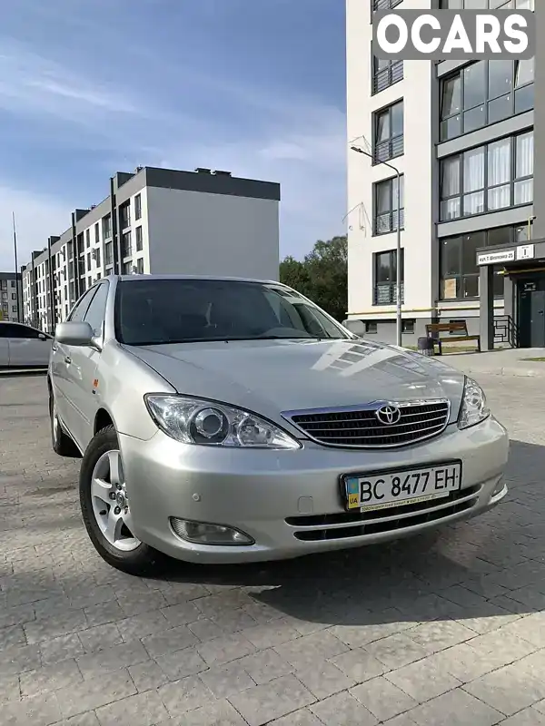 Седан Toyota Camry 2004 2.4 л. Автомат обл. Львівська, Новояворівськ - Фото 1/21