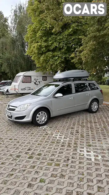 Універсал Opel Astra 2009 1.69 л. Ручна / Механіка обл. Рівненська, location.city.smyha - Фото 1/20