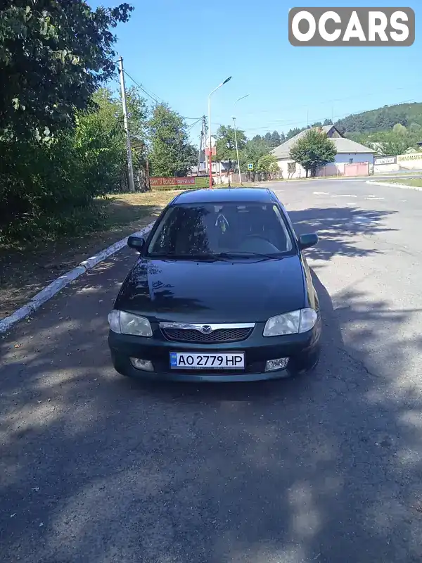 Хетчбек Mazda 323 1998 1.5 л. Ручна / Механіка обл. Закарпатська, Свалява - Фото 1/10