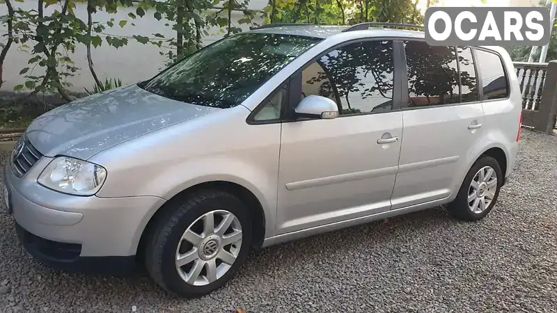 Минивэн Volkswagen Touran 2005 1.9 л. Ручная / Механика обл. Закарпатская, Иршава - Фото 1/13