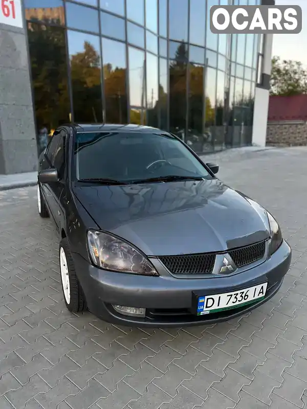 Седан Mitsubishi Lancer 2005 1.6 л. Ручна / Механіка обл. Рівненська, Рівне - Фото 1/18