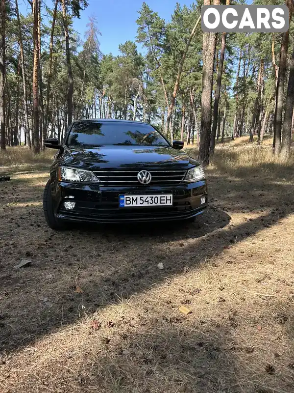 Седан Volkswagen Jetta 2016 1.8 л. Автомат обл. Сумська, Суми - Фото 1/21