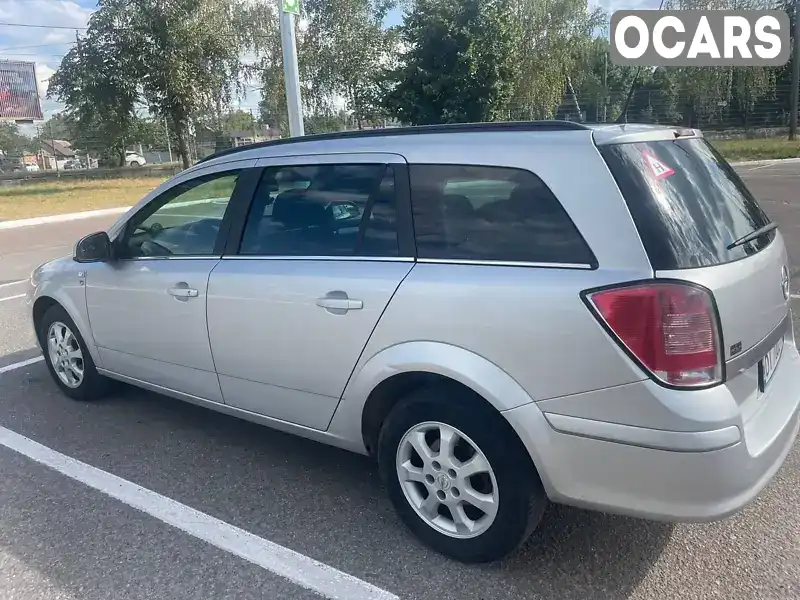 W0L0AHL35A2098707 Opel Astra 2010 Універсал 1.7 л. Фото 7