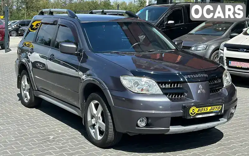 Внедорожник / Кроссовер Mitsubishi Outlander 2007 2.38 л. Автомат обл. Черновицкая, Черновцы - Фото 1/19