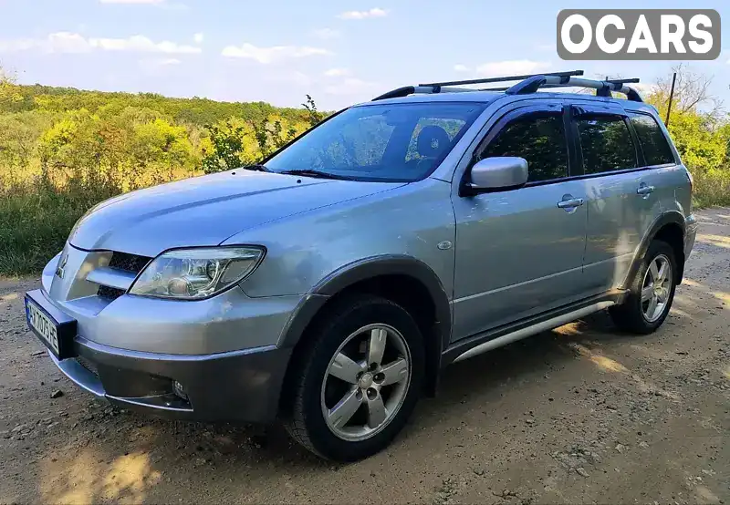 Позашляховик / Кросовер Mitsubishi Outlander 2006 2 л. Ручна / Механіка обл. Харківська, Чугуїв - Фото 1/14