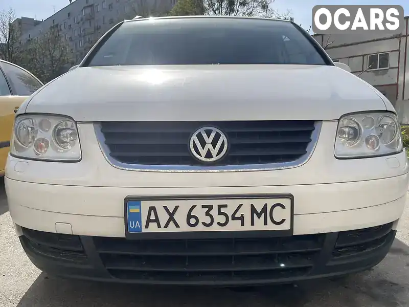 Мінівен Volkswagen Touran 2006 1.9 л. Ручна / Механіка обл. Харківська, Харків - Фото 1/14