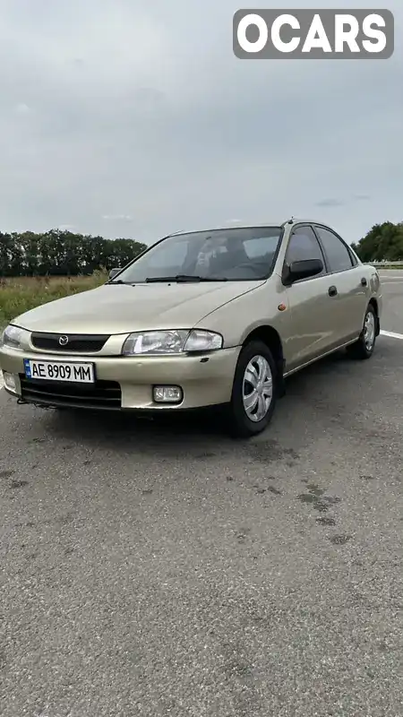 Седан Mazda 323 1998 1.5 л. Ручна / Механіка обл. Дніпропетровська, Дніпро (Дніпропетровськ) - Фото 1/21