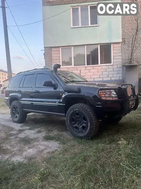 Позашляховик / Кросовер Jeep Grand Cherokee 2003 2.69 л. Автомат обл. Житомирська, Олевськ - Фото 1/18