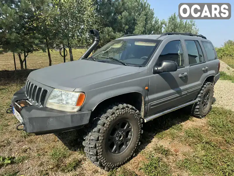 1J8GWE8292Y101082 Jeep Grand Cherokee 2001 Внедорожник / Кроссовер 2.69 л. Фото 3