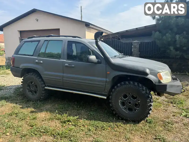 1J8GWE8292Y101082 Jeep Grand Cherokee 2001 Внедорожник / Кроссовер 2.69 л. Фото 4