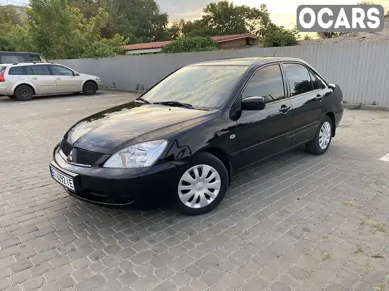 Седан Mitsubishi Lancer 2008 1.58 л. Автомат обл. Полтавська, Козельщина - Фото 1/21