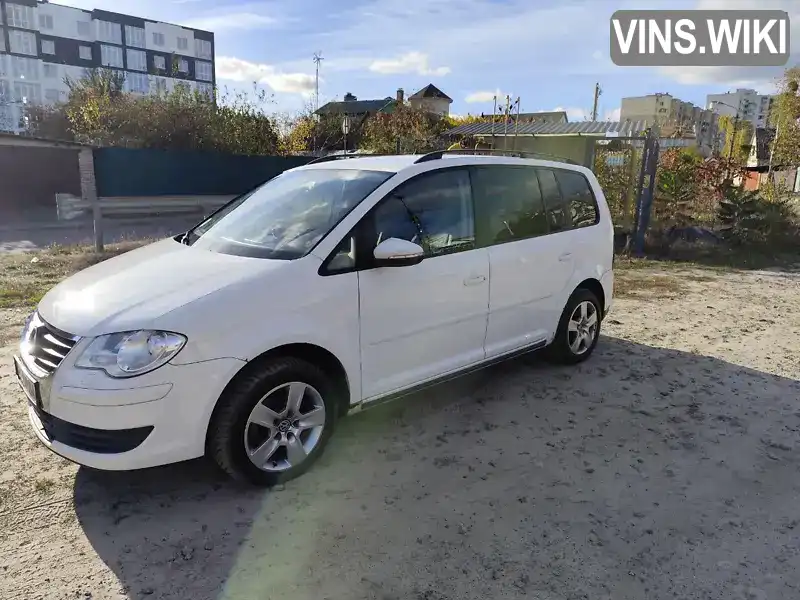 Мінівен Volkswagen Touran 2010 1.9 л. Автомат обл. Київська, Київ - Фото 1/21