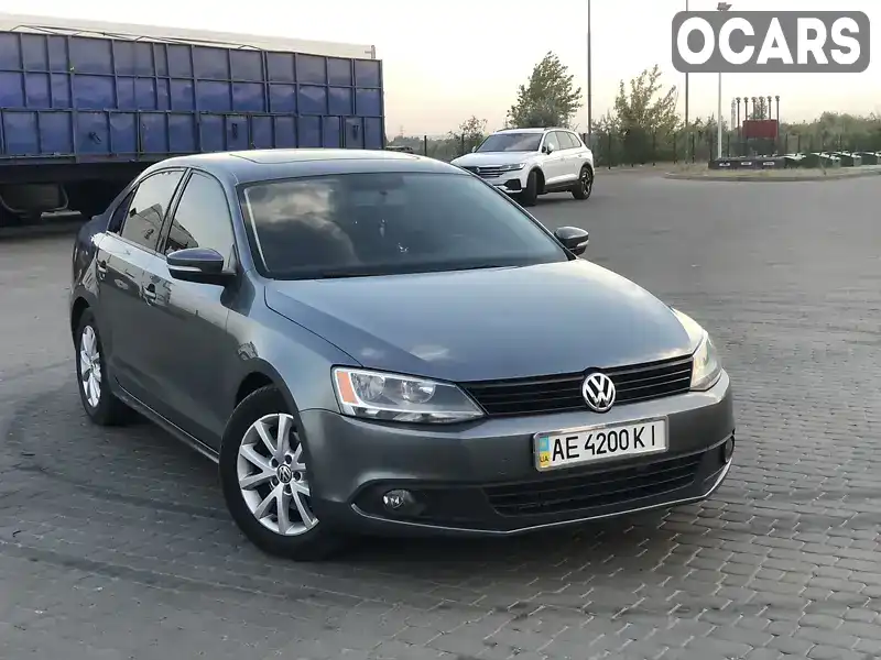 Седан Volkswagen Jetta 2012 2.48 л. обл. Дніпропетровська, Новомосковськ - Фото 1/17