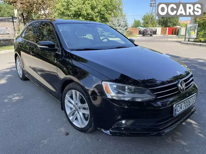 Седан Volkswagen Jetta 2014 2 л. Автомат обл. Черкаська, Тальне - Фото 1/21