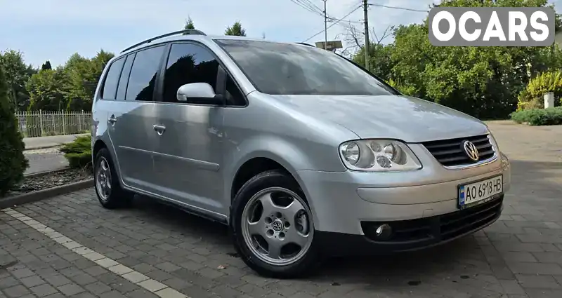 Мінівен Volkswagen Touran 2004 1.97 л. Ручна / Механіка обл. Закарпатська, Берегове - Фото 1/21