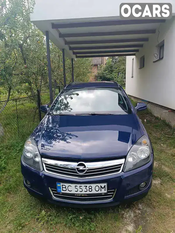 W0L0AHL35A2122959 Opel Astra 2010 Универсал 1.69 л. Фото 1