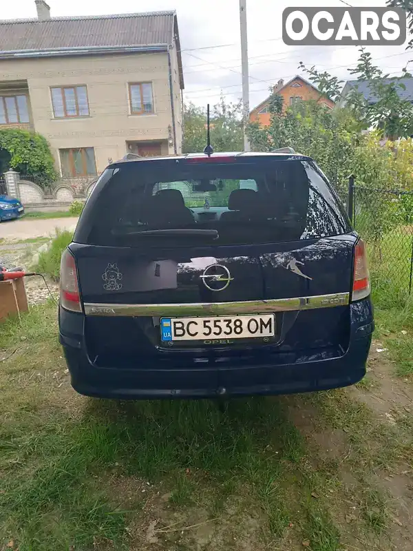 W0L0AHL35A2122959 Opel Astra 2010 Универсал 1.69 л. Фото 4