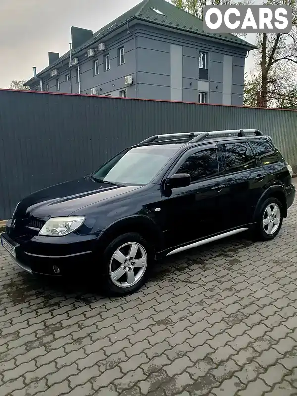 Позашляховик / Кросовер Mitsubishi Outlander 2008 2.38 л. Автомат обл. Чернівецька, Чернівці - Фото 1/14