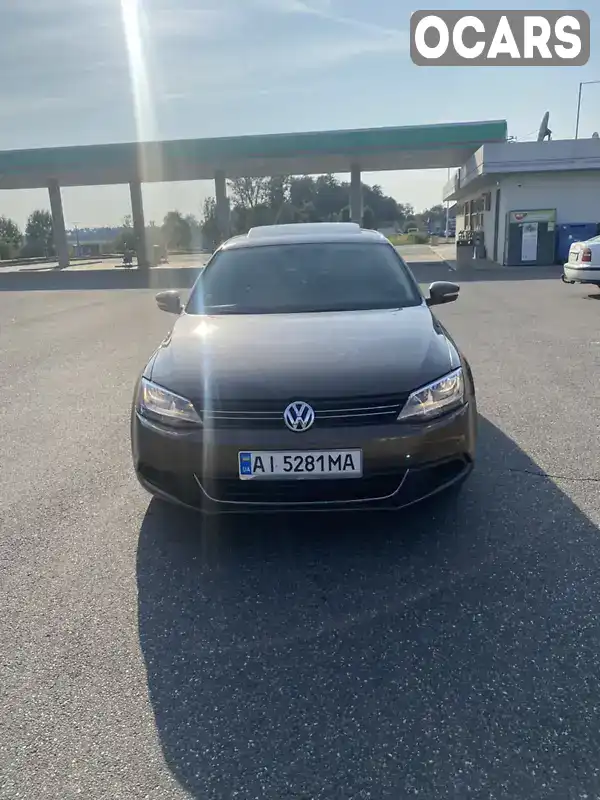 Седан Volkswagen Jetta 2013 1.97 л. Автомат обл. Закарпатська, Тячів - Фото 1/18