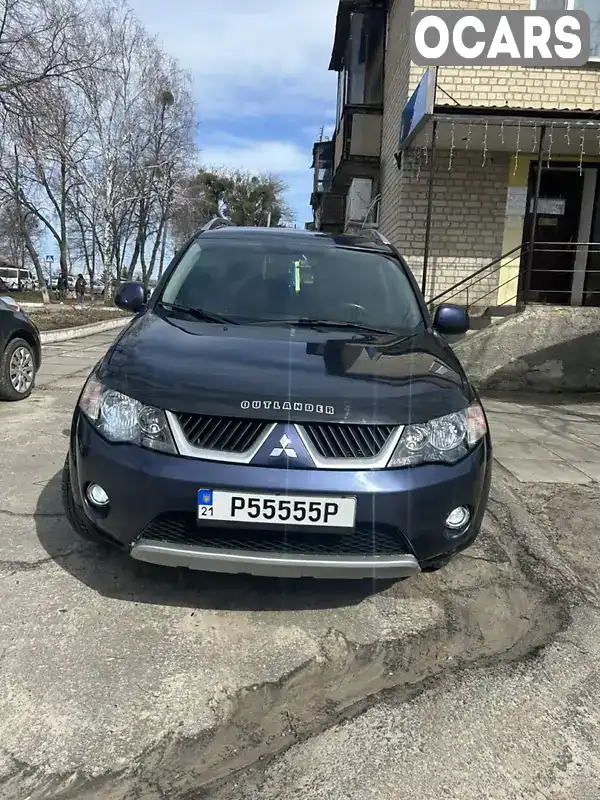 Позашляховик / Кросовер Mitsubishi Outlander XL 2009 2.4 л. Варіатор обл. Харківська, Нова Водолага - Фото 1/7