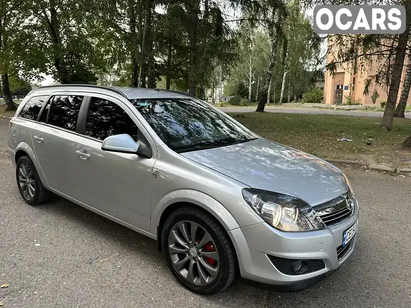 W0L0AHL35A2082857 Opel Astra 2010 Универсал 1.7 л. Фото 1