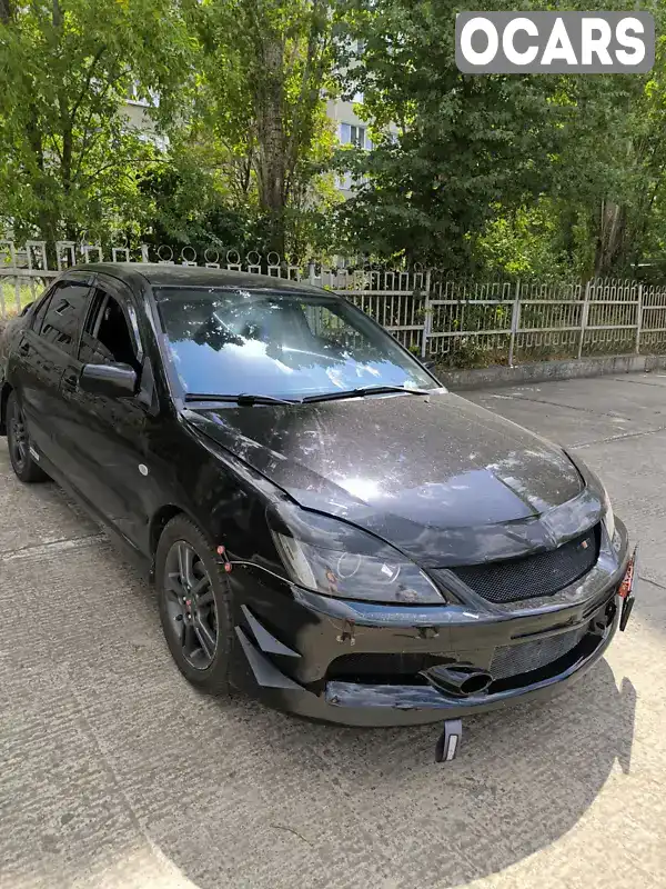 Седан Mitsubishi Lancer 2007 2 л. Ручна / Механіка обл. Миколаївська, Южноукраїнськ - Фото 1/13