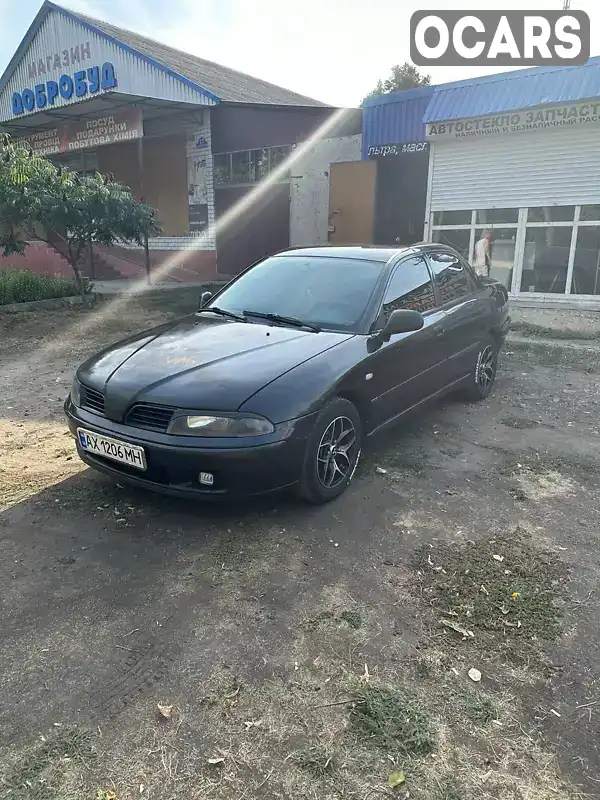 Седан Mitsubishi Carisma 2003 1.6 л. Ручна / Механіка обл. Харківська, Харків - Фото 1/14