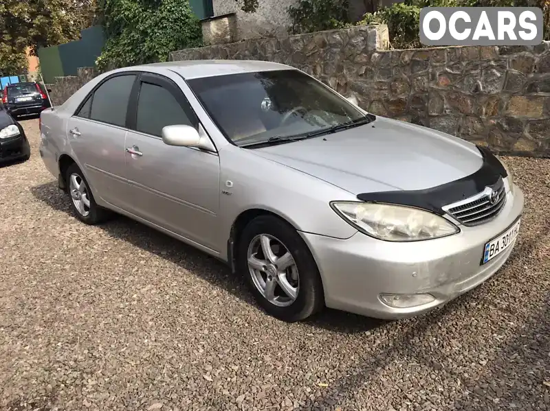 Седан Toyota Camry 2004 2.4 л. Ручна / Механіка обл. Миколаївська, Первомайськ - Фото 1/14