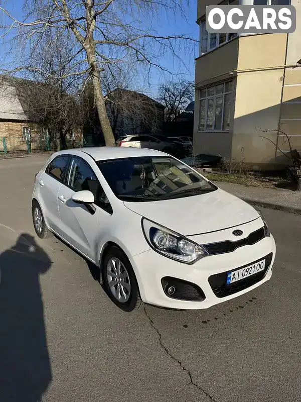 Хетчбек Kia Rio 2011 1.12 л. Ручна / Механіка обл. Київська, Вишневе - Фото 1/15