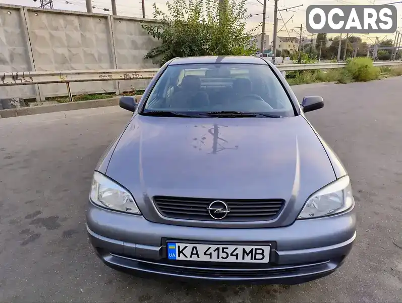 Седан Opel Astra 2008 1.6 л. Ручная / Механика обл. Киевская, Вышневое - Фото 1/21